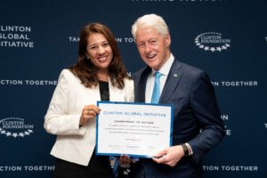 Carolina Martinez with President Bill Clinton at CGI 2022