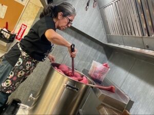 Photo of Pamela Marquez brewing hibiscus tea