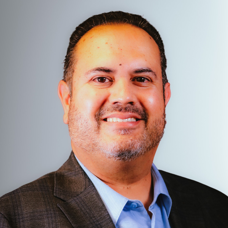 Portrait of Alex Alvarez